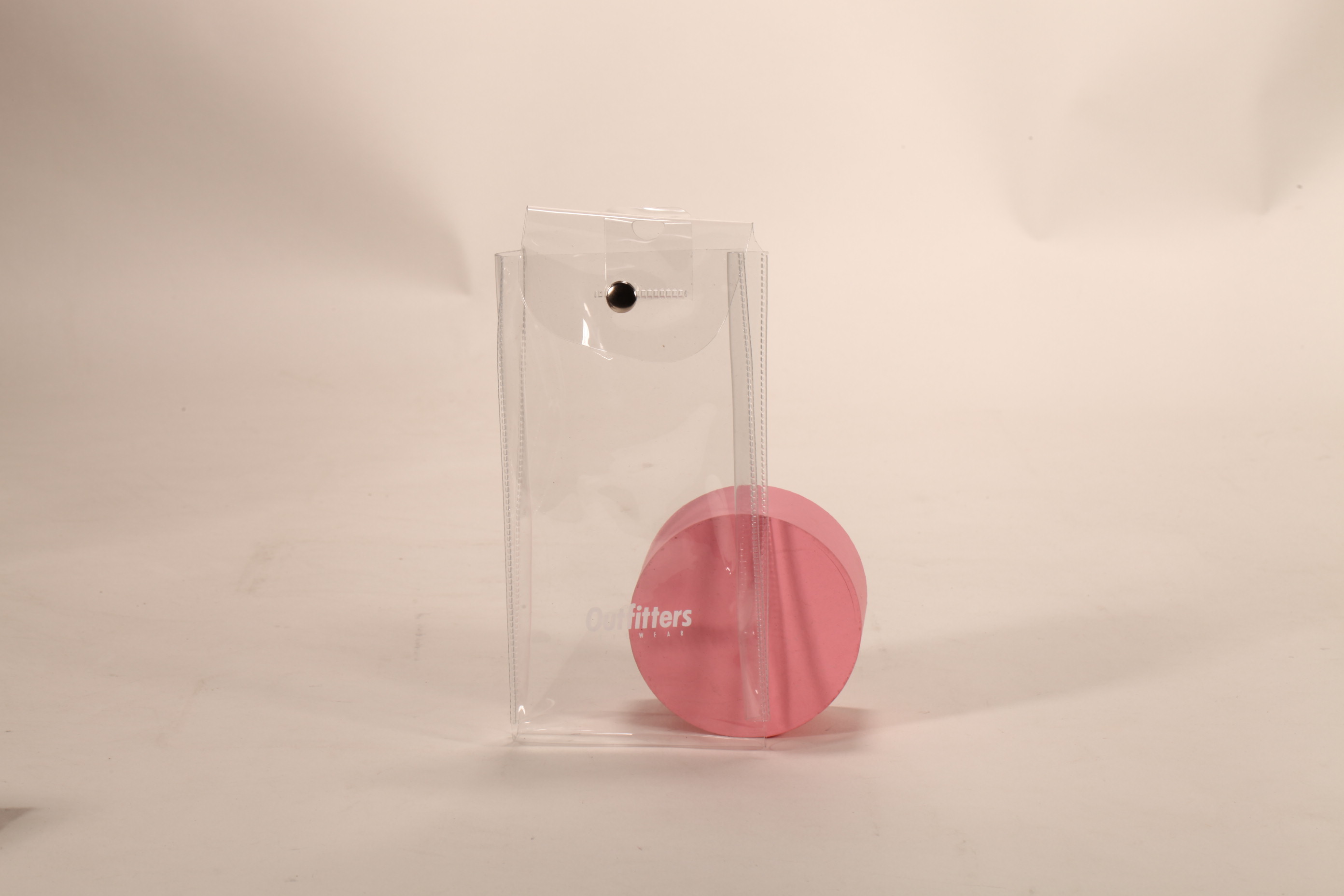 A clear plastic eyewear case with a customizable LOGO