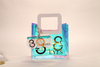 A translucent plastic suit, tote bag and glasses bag, stylish and novel, clever design