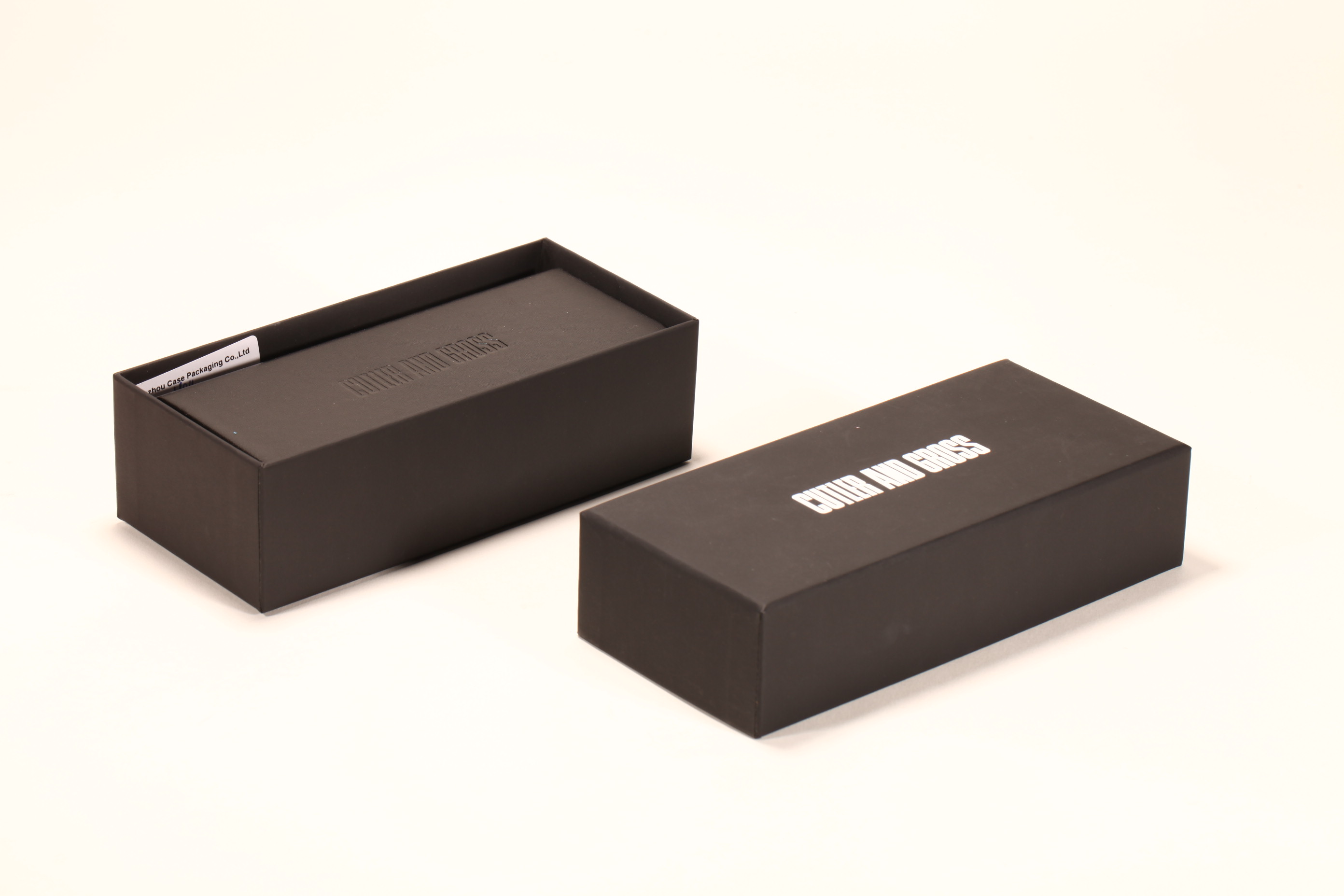 A black glasses case set, including cardboard box, handmade glasses case, paper card, glasses cloth, instruction manual