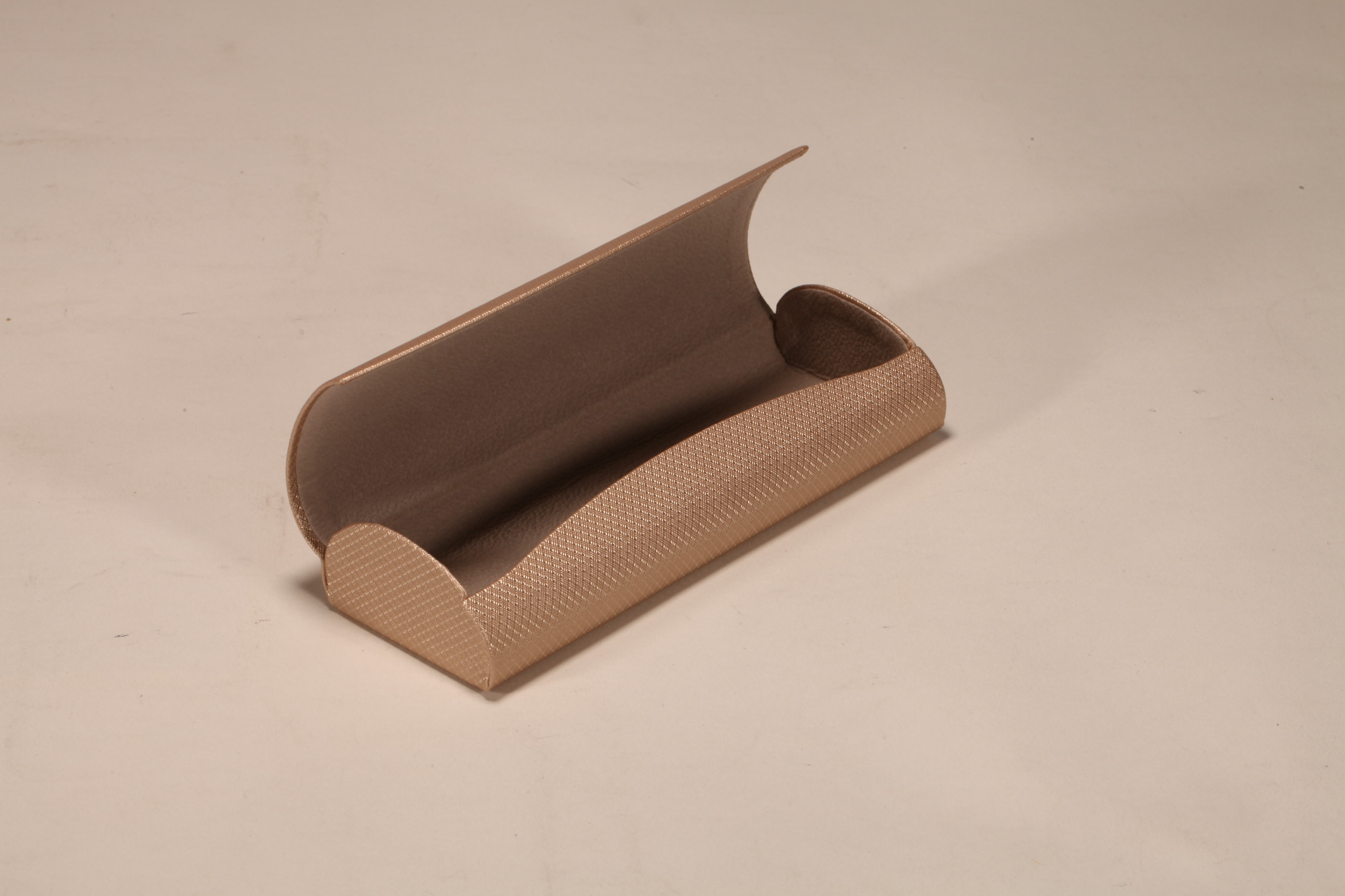 A brown-gold hand-made glasses case printed with Chinese LOGO, made of canary