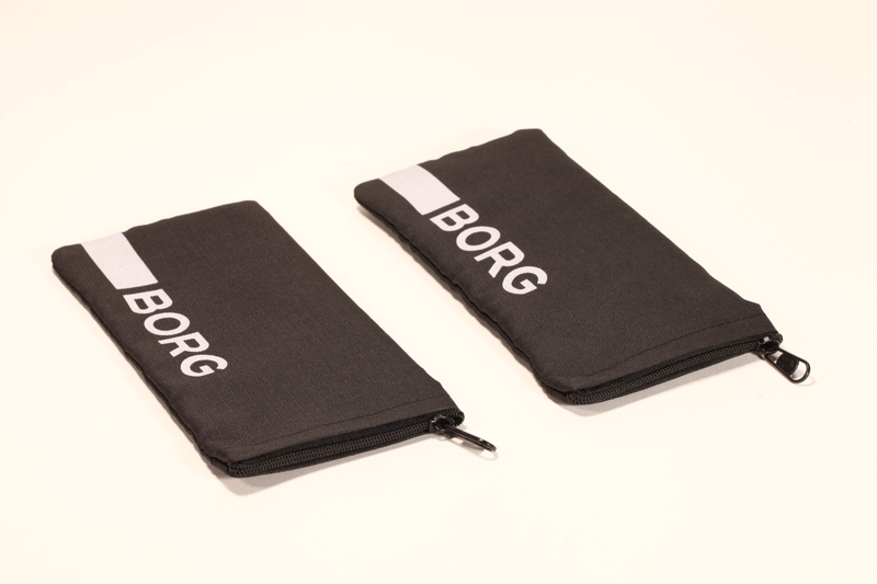 A zippered eyewear bag made of polyester fabric that can hold all kinds of small objects