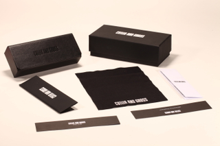 A black glasses case set, including cardboard box, handmade glasses case, paper card, glasses cloth, instruction manual