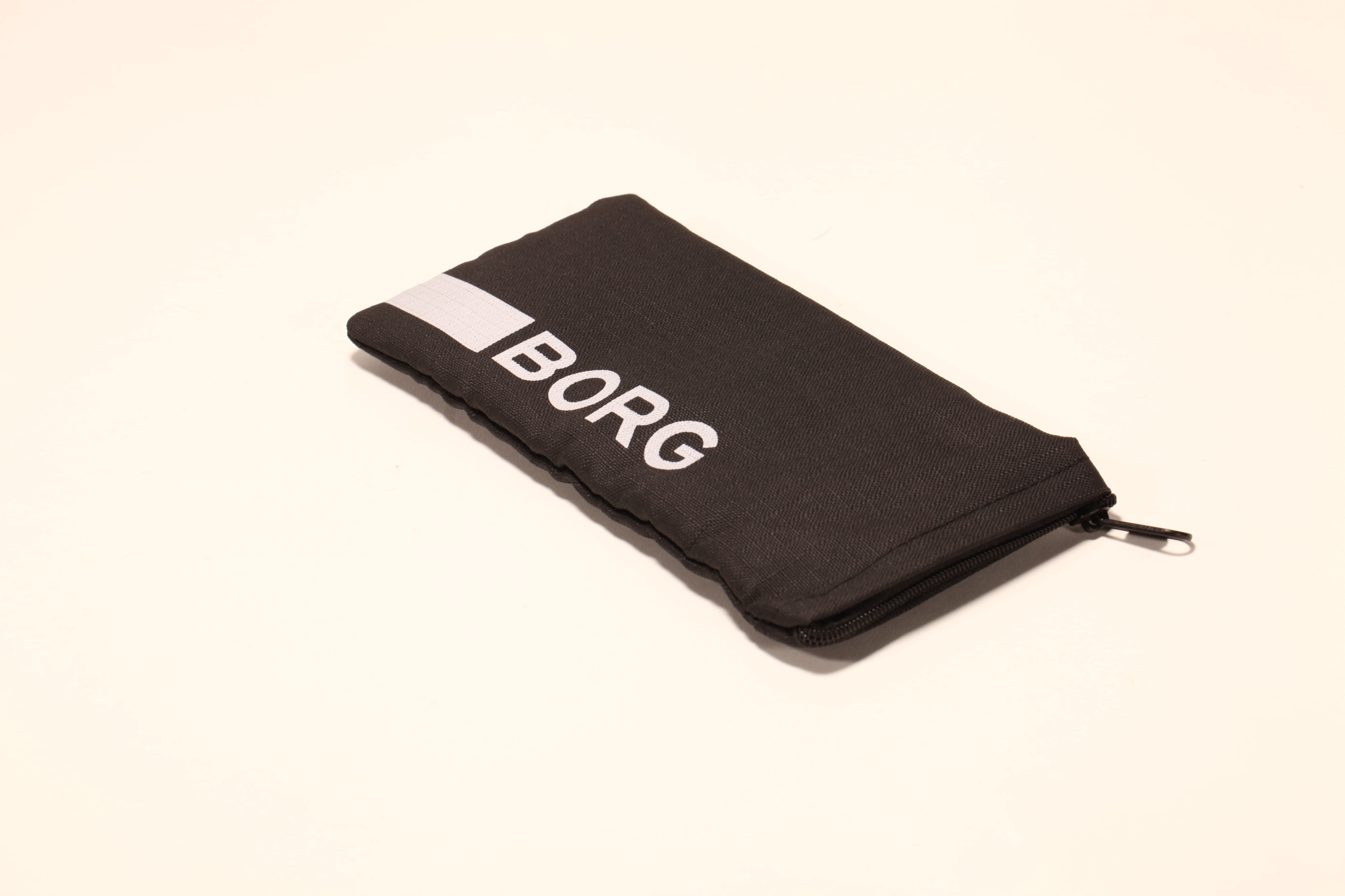 A zippered eyewear bag made of polyester fabric that can hold all kinds of small objects
