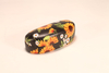 An eyeglass case set consisting of an eyeglass case and a leather case printed with chrysanthemums and sunflowers