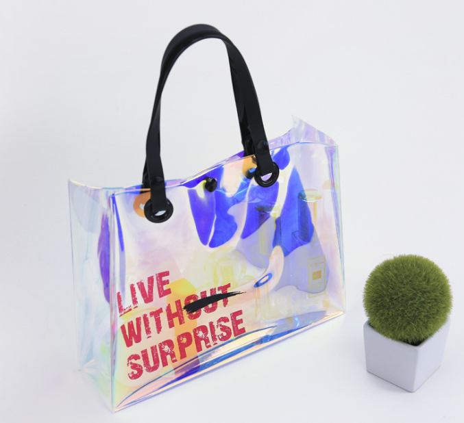 2009 New Transparent Handbag Laser TPU Button Waterproof Travel Bag Environmentally Friendly Fashion Women's Bag