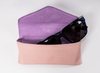 The Sunglasses Are A Two-color Glasses Case with LOGO Printed on It, And The Clamshell Is A Triangle. It Looks Like A Small Leather Bag